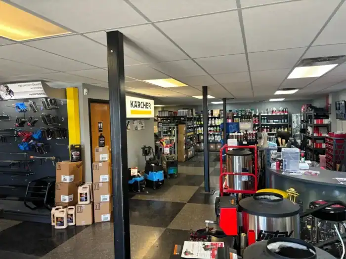Hotsy of Nashville showroom wall stocked with pressure washer accessories, hoses, and parts