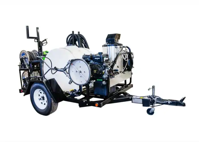 A mobile pressure washing trailer with water tank, hoses, and cleaning equipment on a single-axle frame, isolated on a white background.
